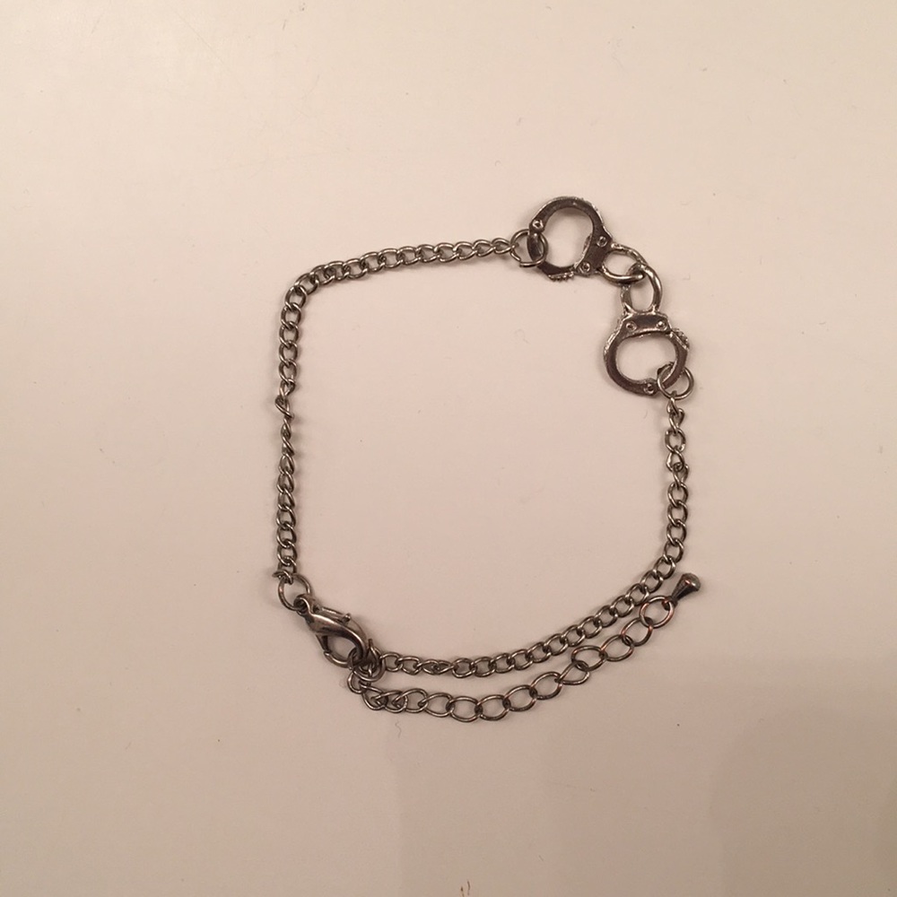 Handcuff charm bracelet